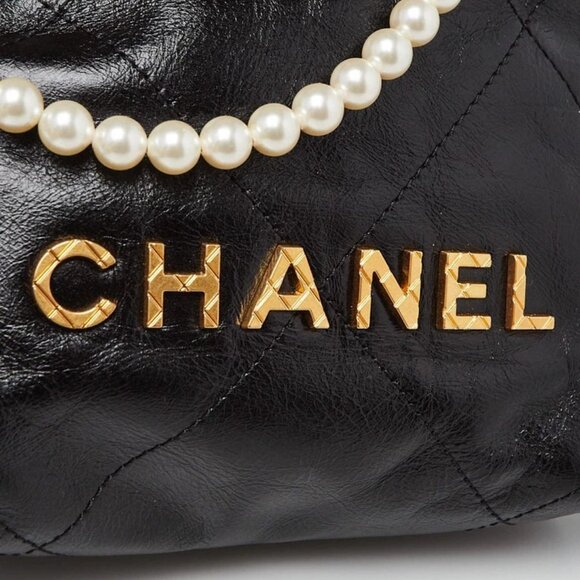 Chanel Black Quilted Shiny Calfskin Leather Pearl Strap Chanel 22 Mini Bag - Picture 8 of 11
